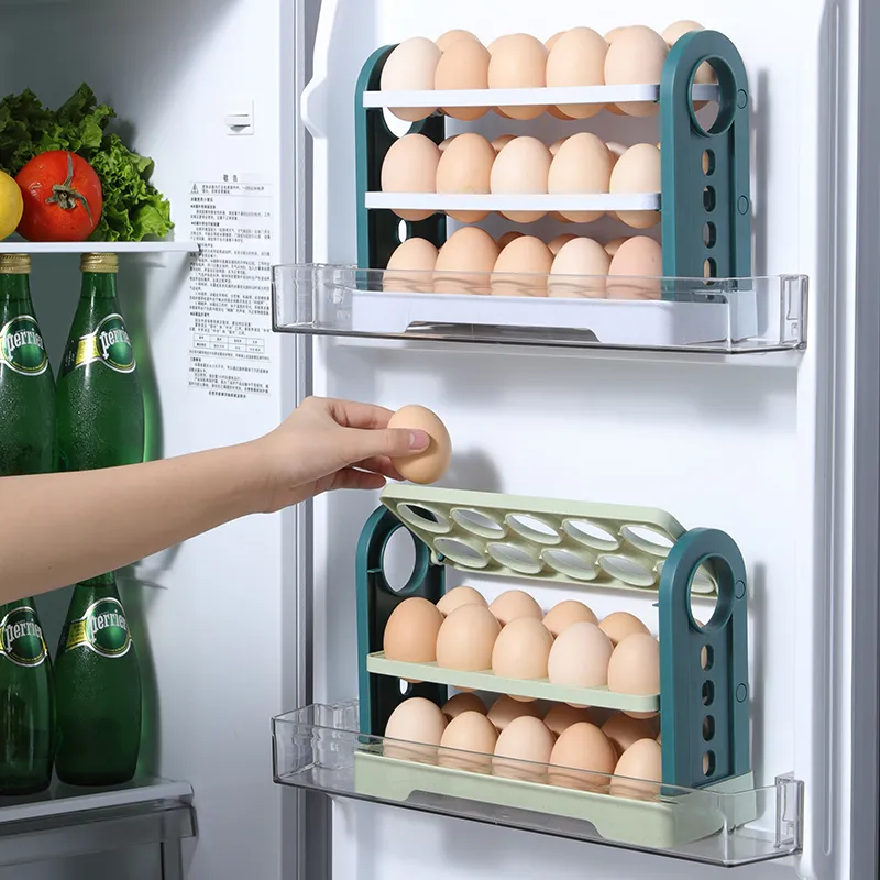 Hand taking an egg from a three-layer flip egg storage rack in a refrigerator door