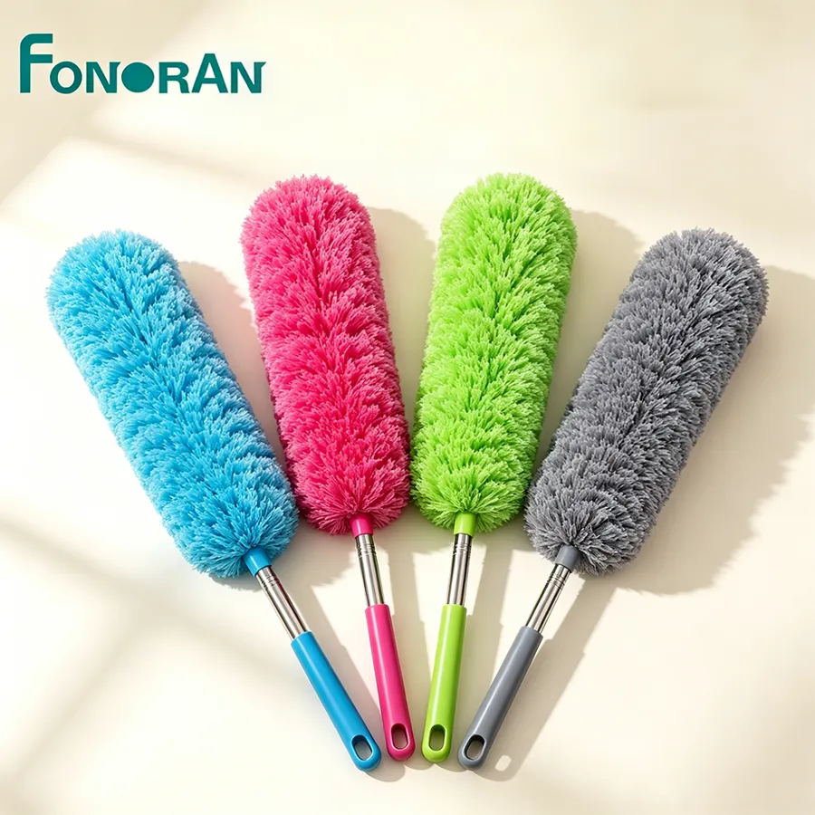 Four Fonoran extendable microfiber dusters in blue, pink, green and grey laid side by side