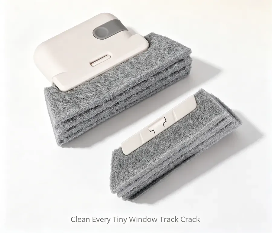 White window groove gap cleaning brush with a stack of grey replacement scrub pads